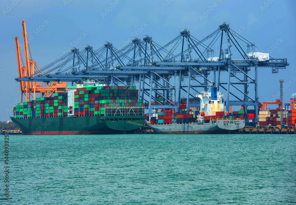 container ship in import export and business logistic.By crane ,Trade Port , Shipping, cargo to harb