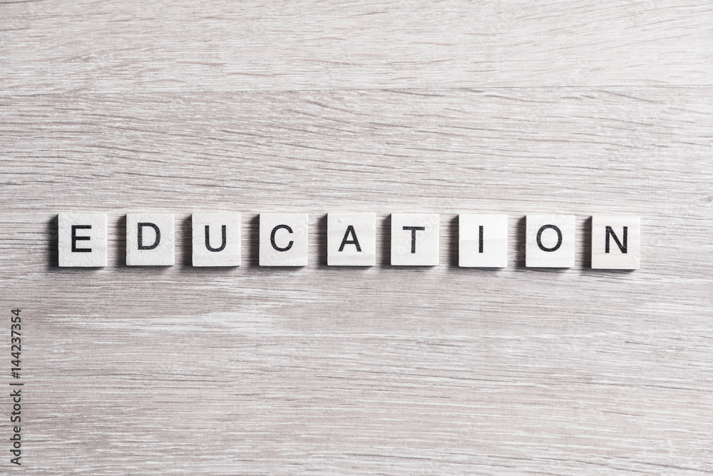 wooden elements with the letters collected in the word education