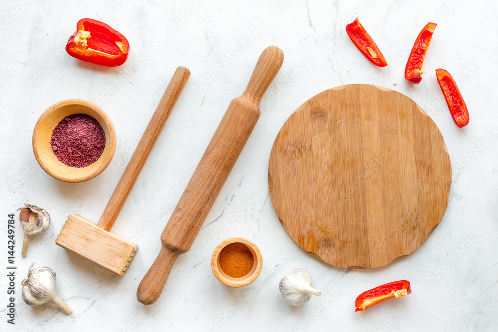 Professional kitchen with rolling-pin for cook on white background top view