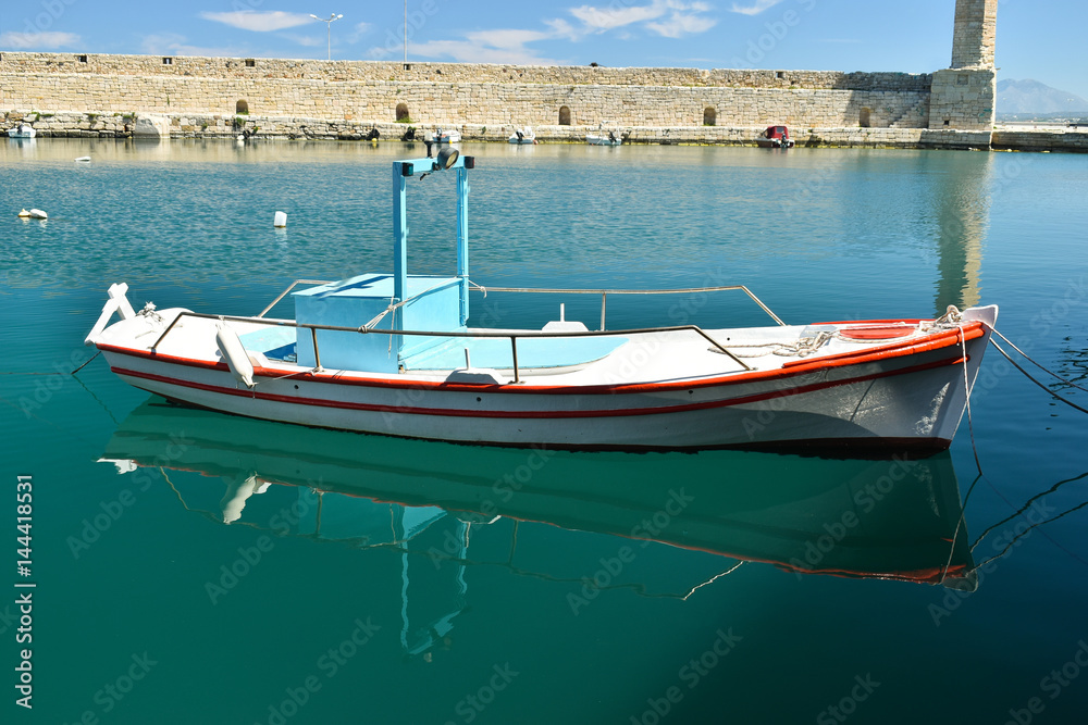 boats in the port on the background of city