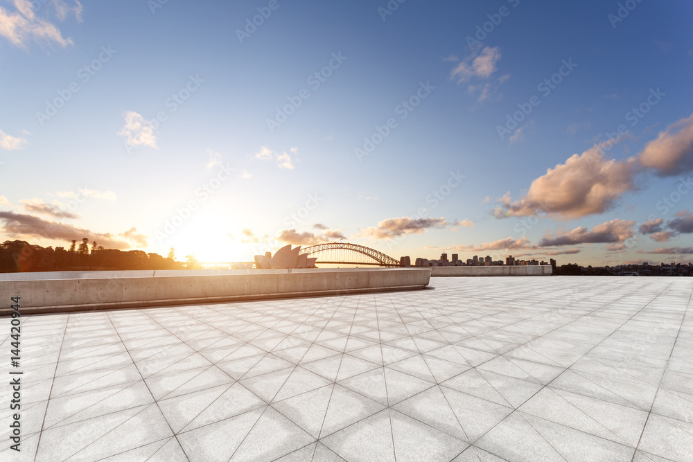 empty floor with bridge and cityscape of modern city