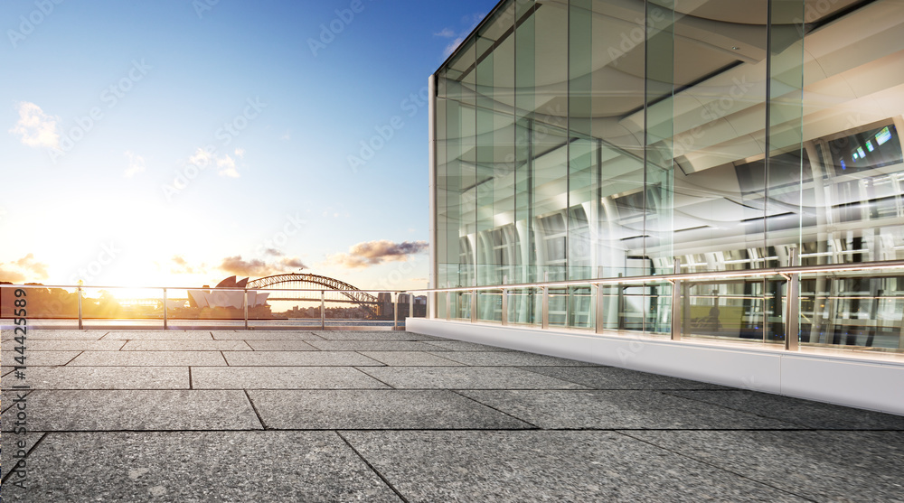 empty floor with bridge and cityscape of modern city