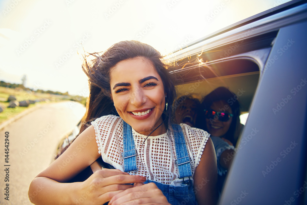 Attractive young woman with a beaming smile