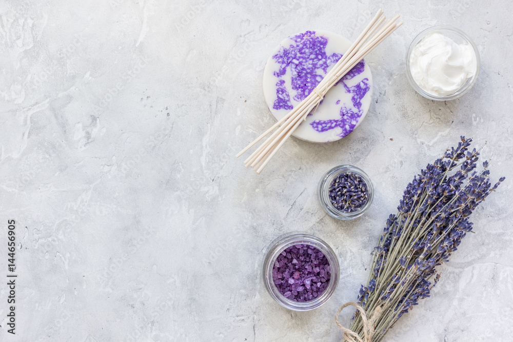 body cream with lavender herbs cosmetic stone background top view mock-up