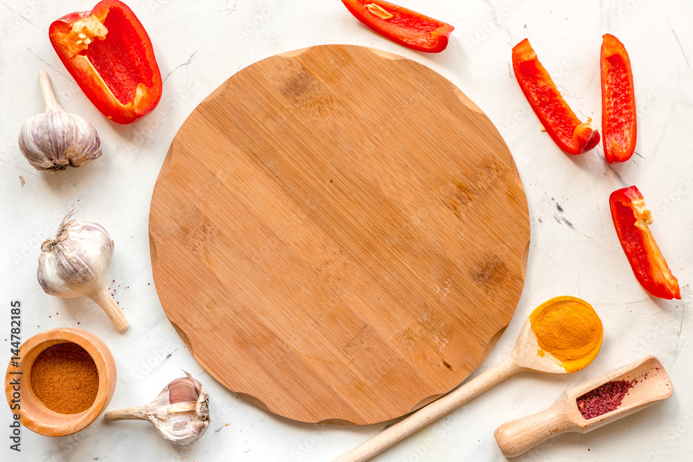 Cook workplace with kitchen tools and cutting pepper white background top view