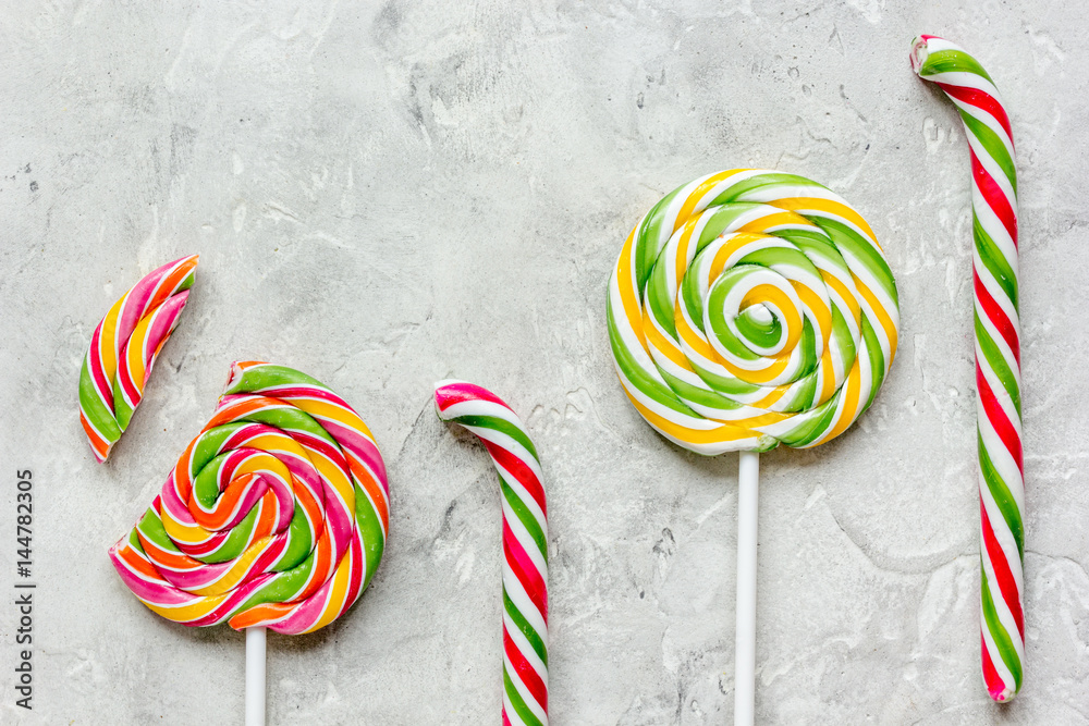 Closeup of candy on gary table background top view mockup