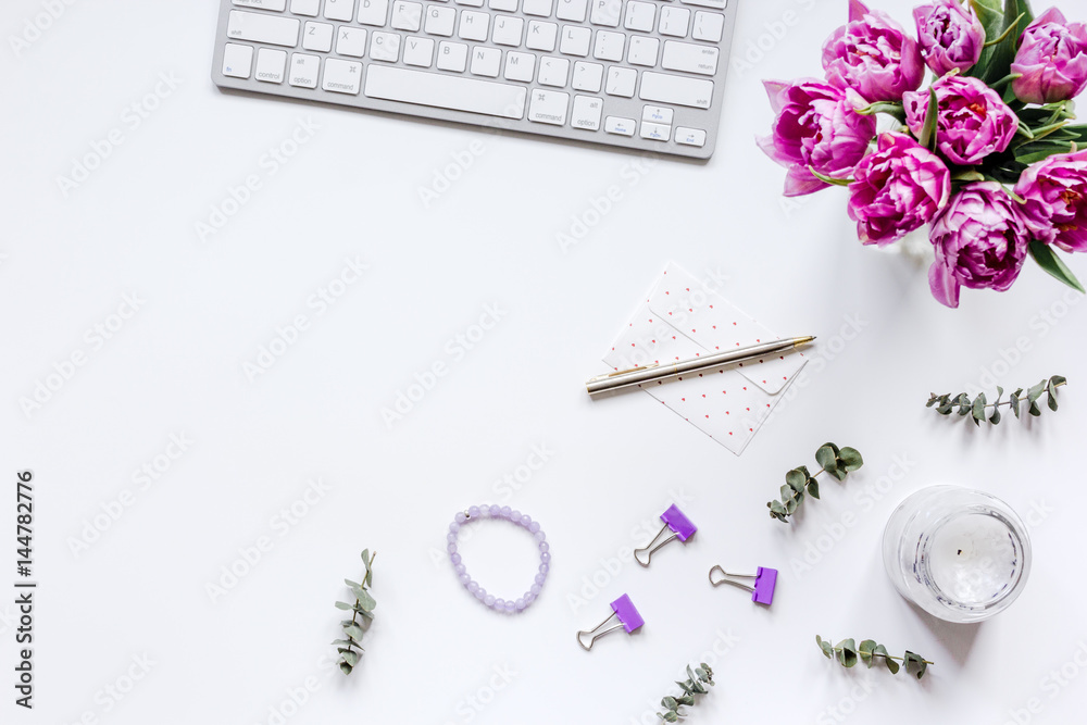 Woman office desk with flowers on white background top view mockup