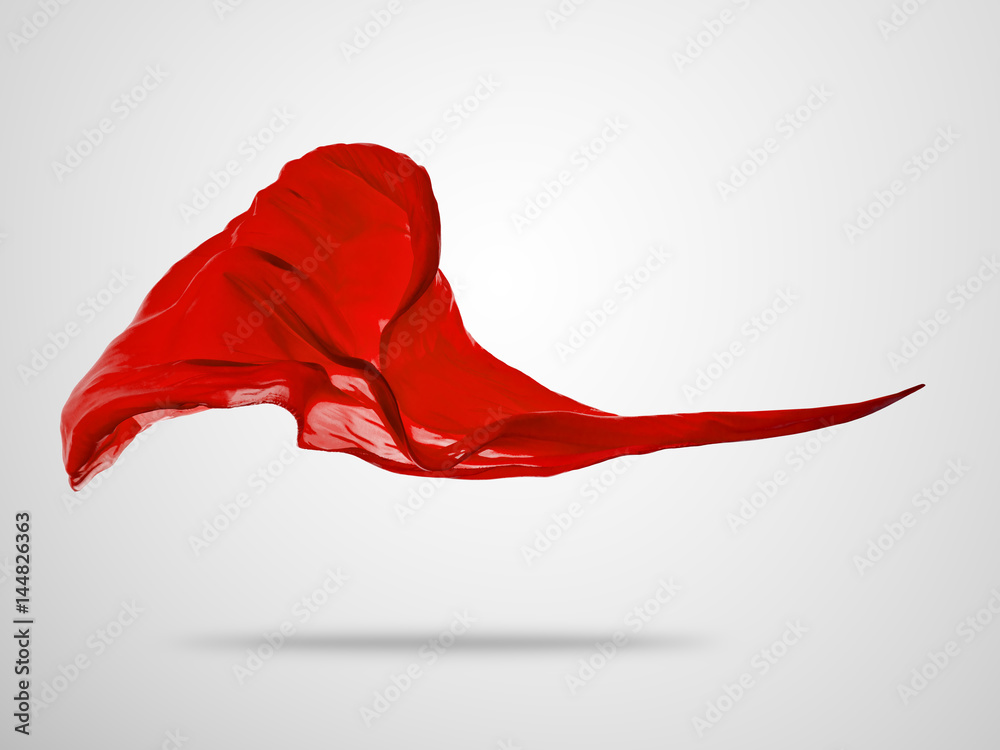 Smooth elegant red cloth on grey background