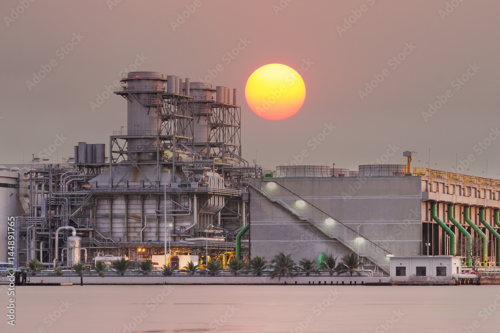 Thermal power plant at sunset