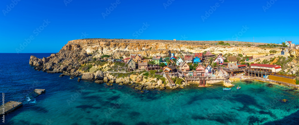 Il-Mellieha, Malta - Panoramic skyline view of the beautiful Popeye Village at Anchor Bay. This vill