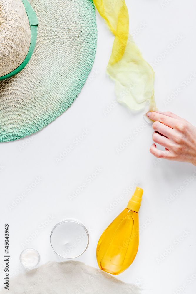 Summer cosmetic set with protection cream on white background top view mock-up