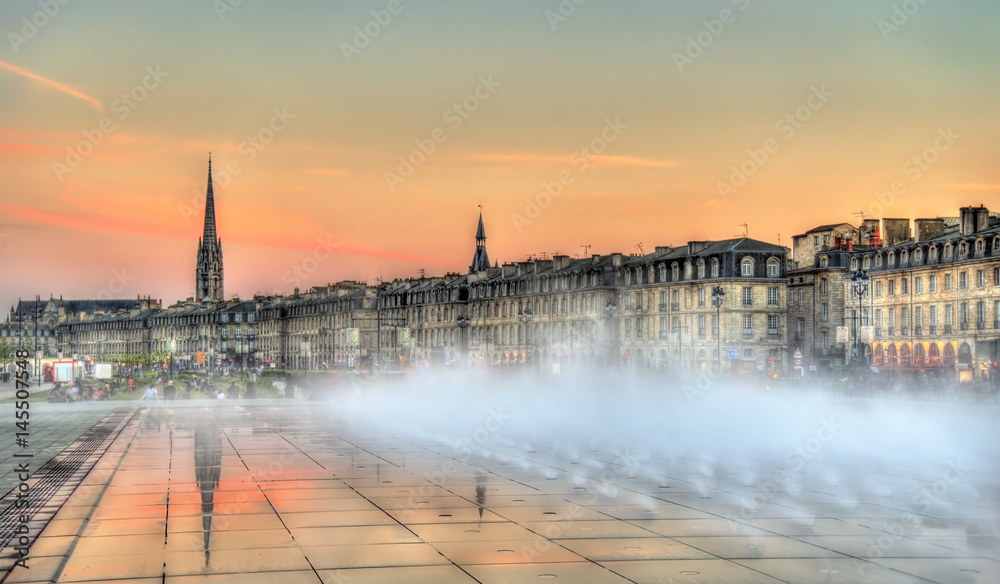 Famous water mirror fountain in front of Place de la Bourse in Bordeaux, France