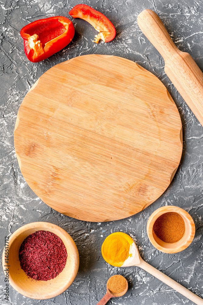 cooking tools in restoraunt concept on gray background top view