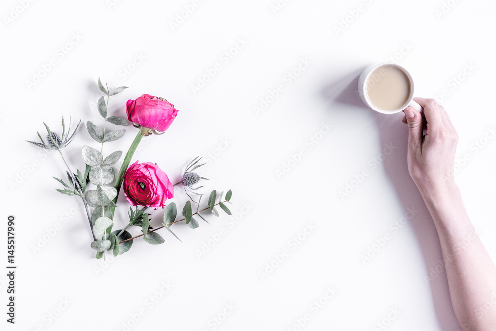 spring with bright flowers mock up on woman desk background top view