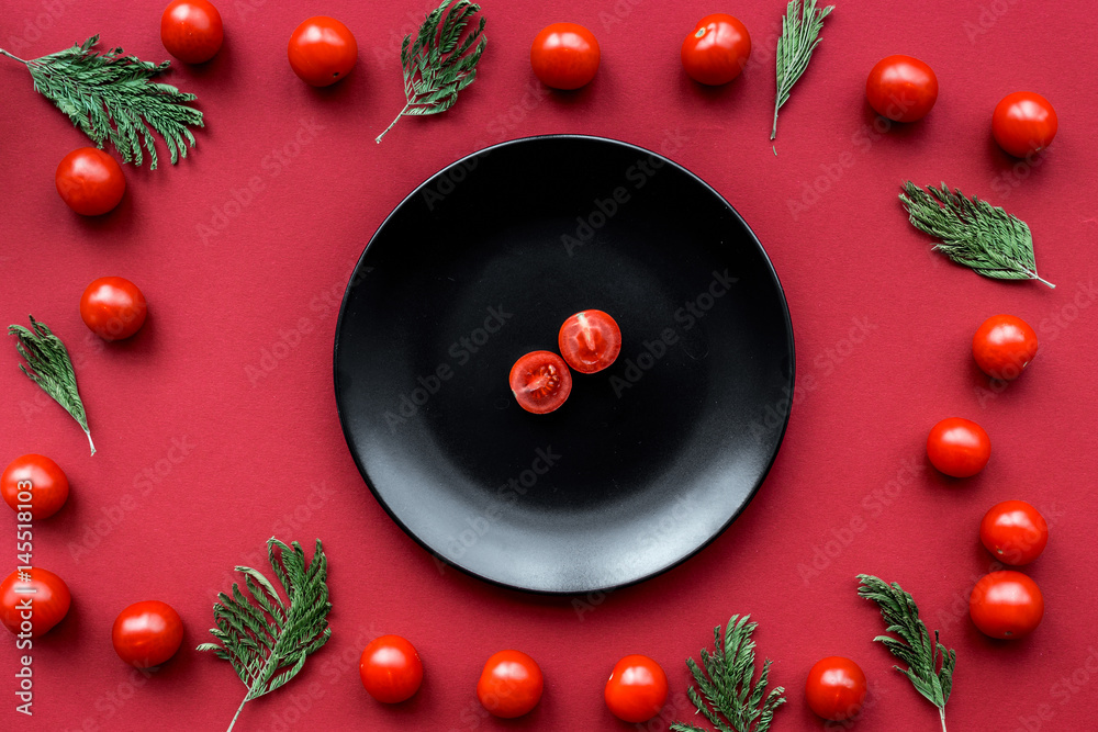 romantic dinner in red color with cherry in plate top view mockup