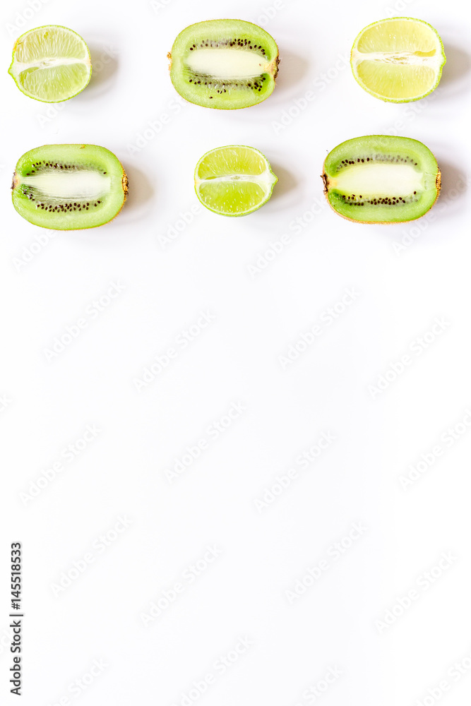 Tropical fruit design on white table background top view space for text