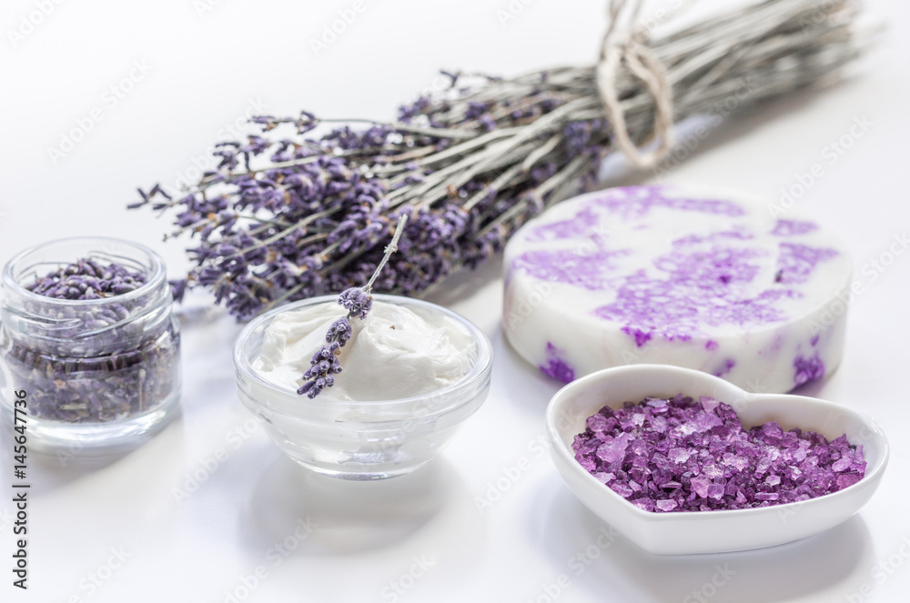 body cream with lavender herbs cosmetic white background