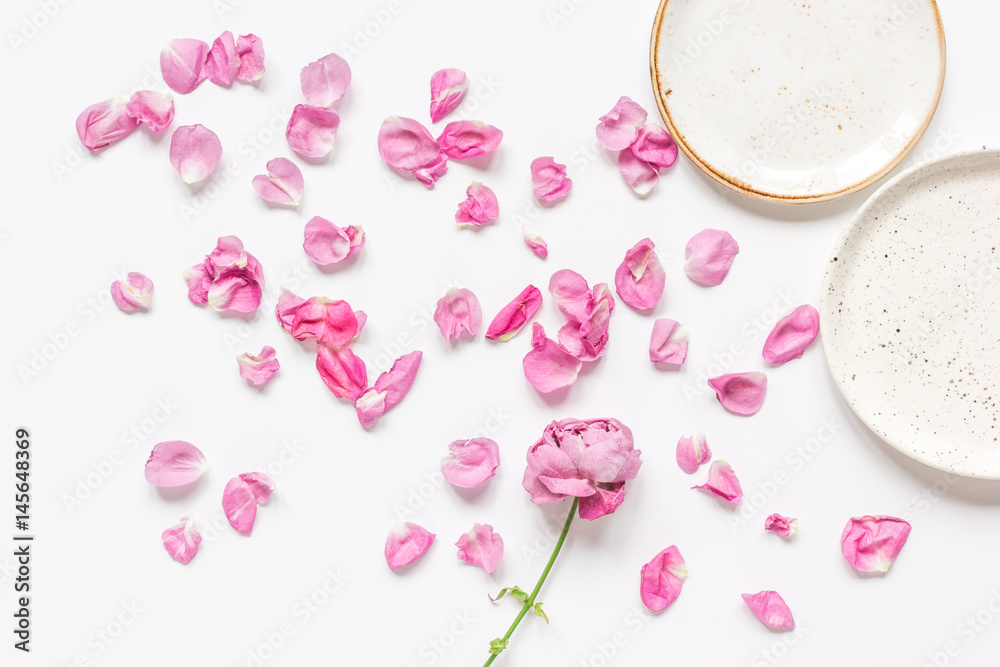 Spring trendy disign with flowers on white table background top view mock up