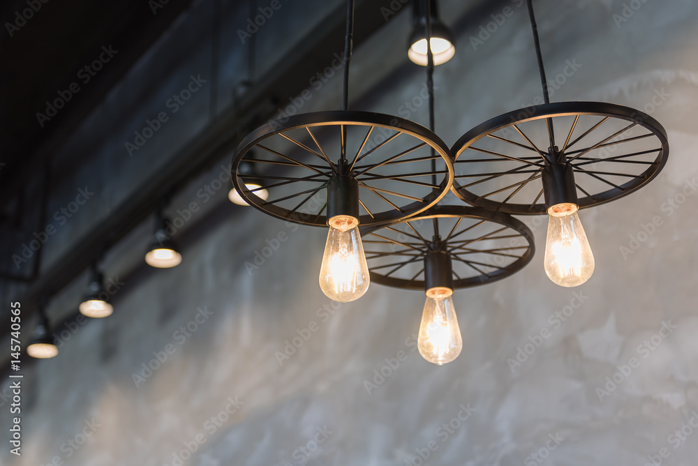 group of hanging lights in coffee shop