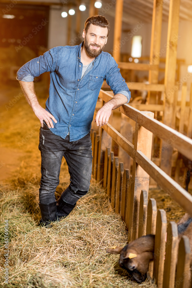 Farmer at the goat barn