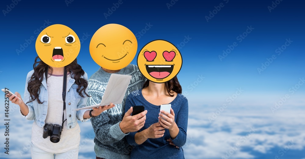 Friends with emojis over faces using technologies in sky