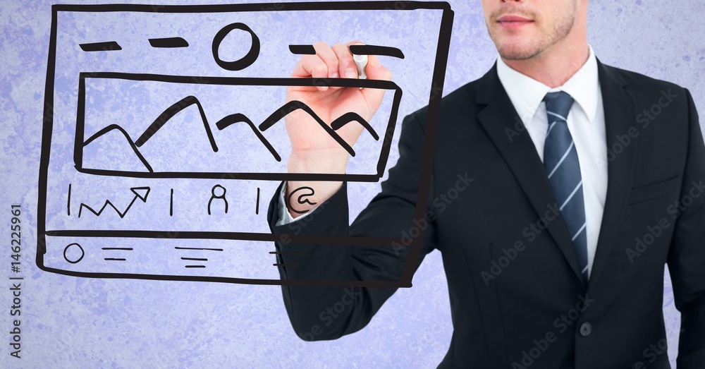 Midsection of businessman drawing mock ups of website