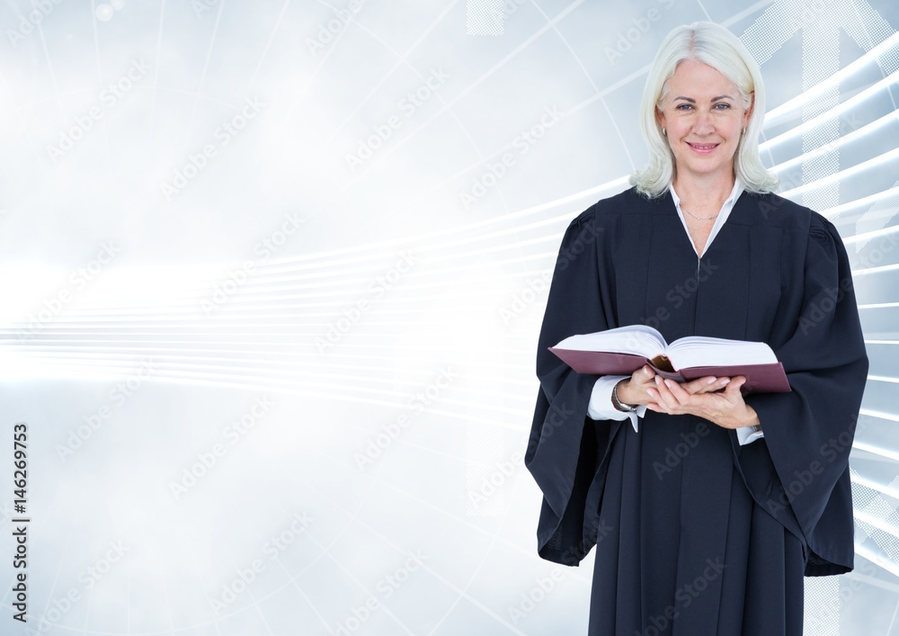 Judge holding book in front of bright background