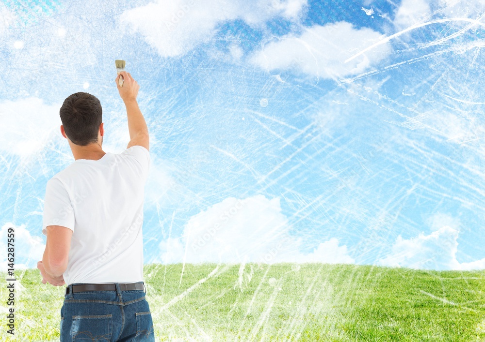 Man painting blue sky clouds