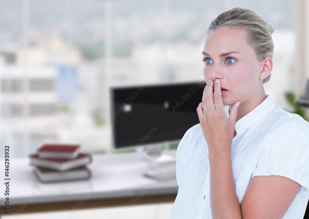 Business woman scared in the office desk