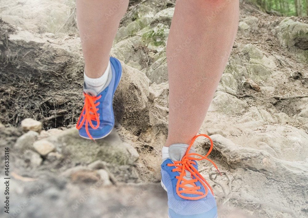 Legs Walking or jogging on rough nature terrain