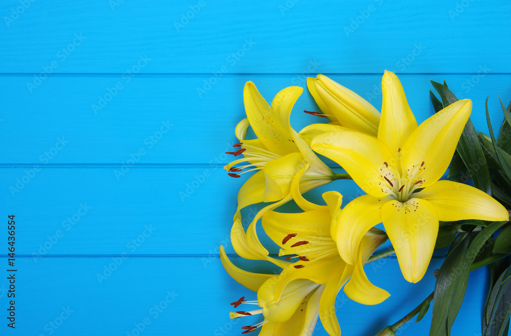  lily flowers on wooden planks