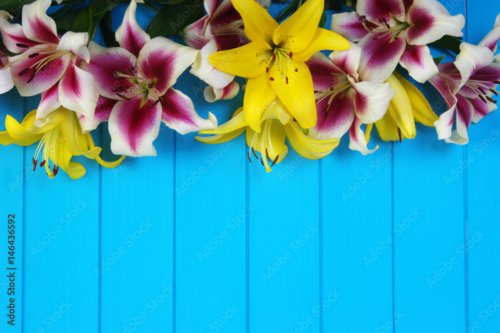  lily flowers on wooden planks