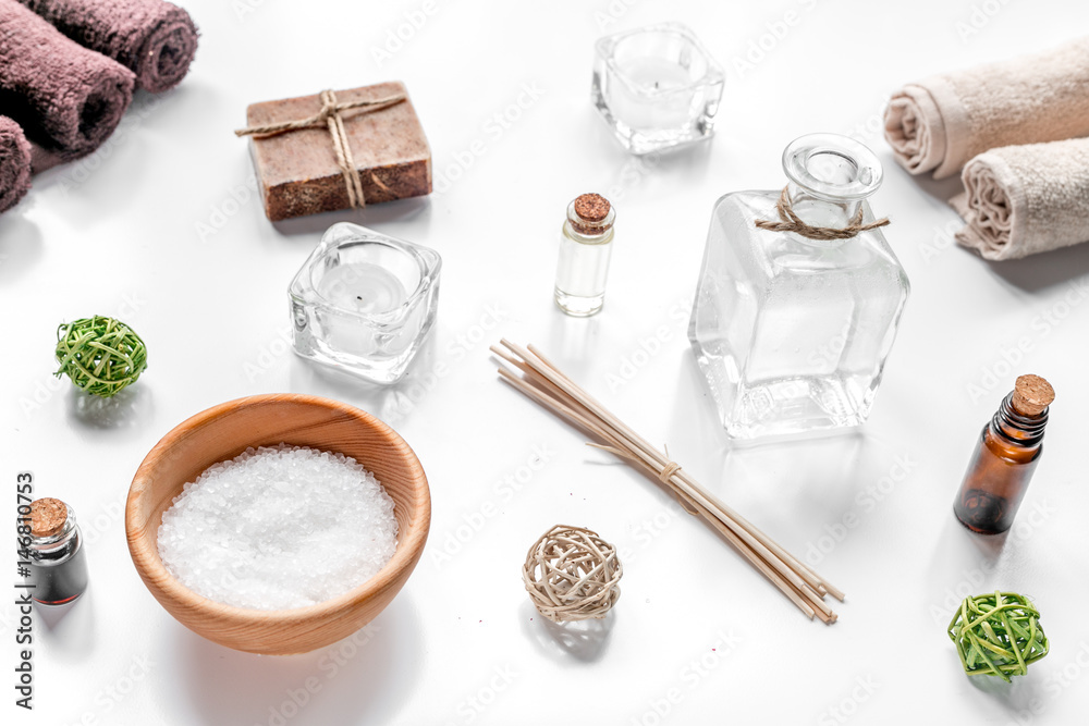 spa set with towels and soap on white background