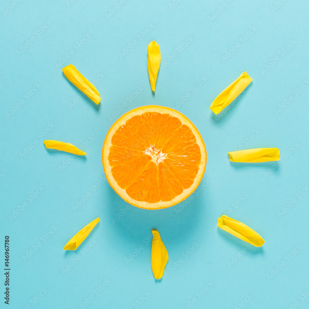 Orange slice as the sun concept