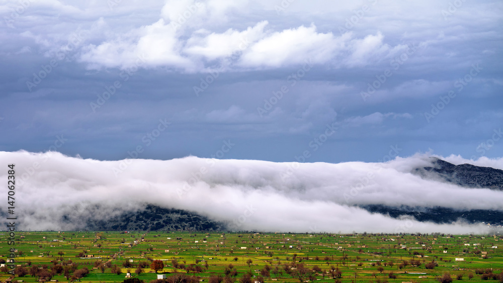 Clouds descend on the Lassithi Plateau, Crete - Greece