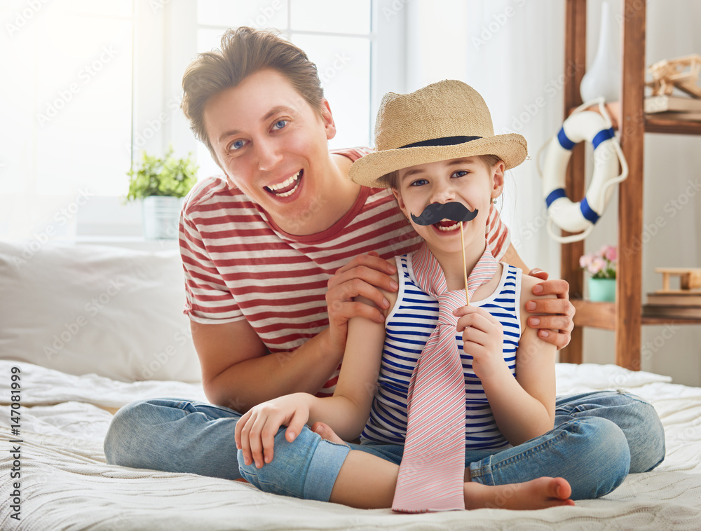 father and daughter play