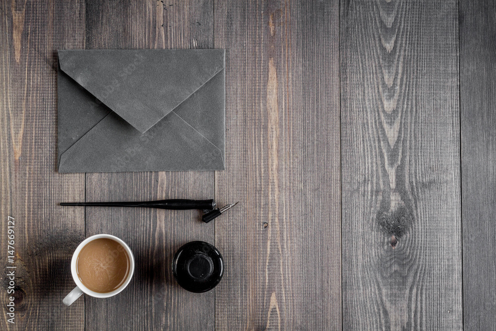 writer workplace with tools on wooden background top view mockup