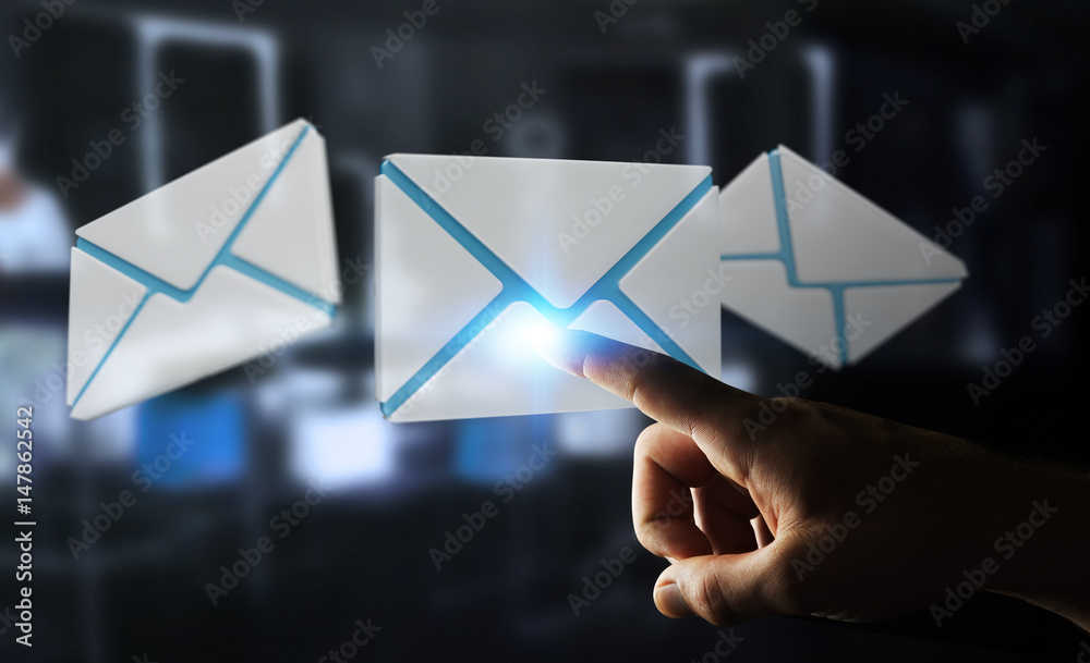 Businessman touching 3D rendering flying email icon with his finger