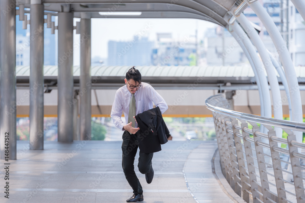 Businessman running late for work