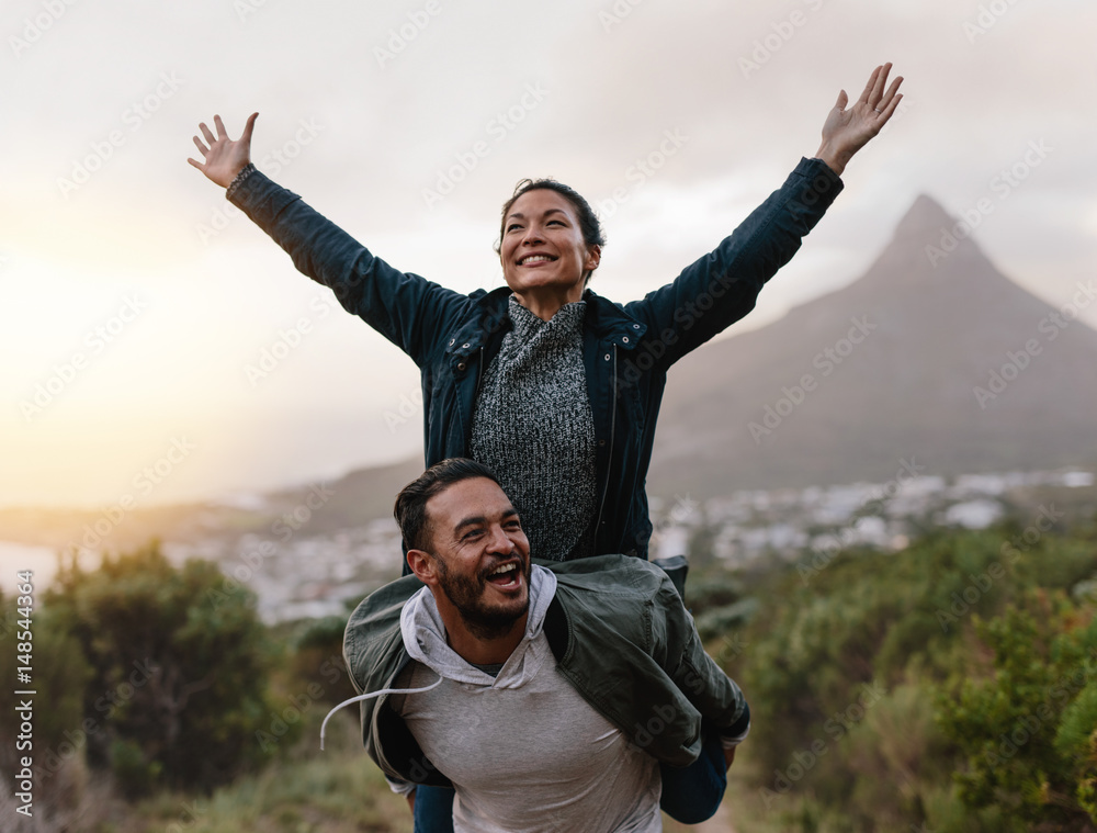 Young couple enjoying themselves in countryside