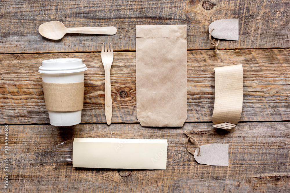 paper bags and plastic cup for take away set top view space for text