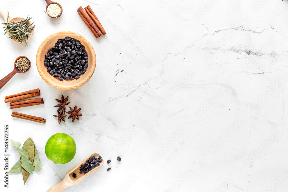 Cooking with spices, vanilla, cinnamon on kitchen table background top view mock-up