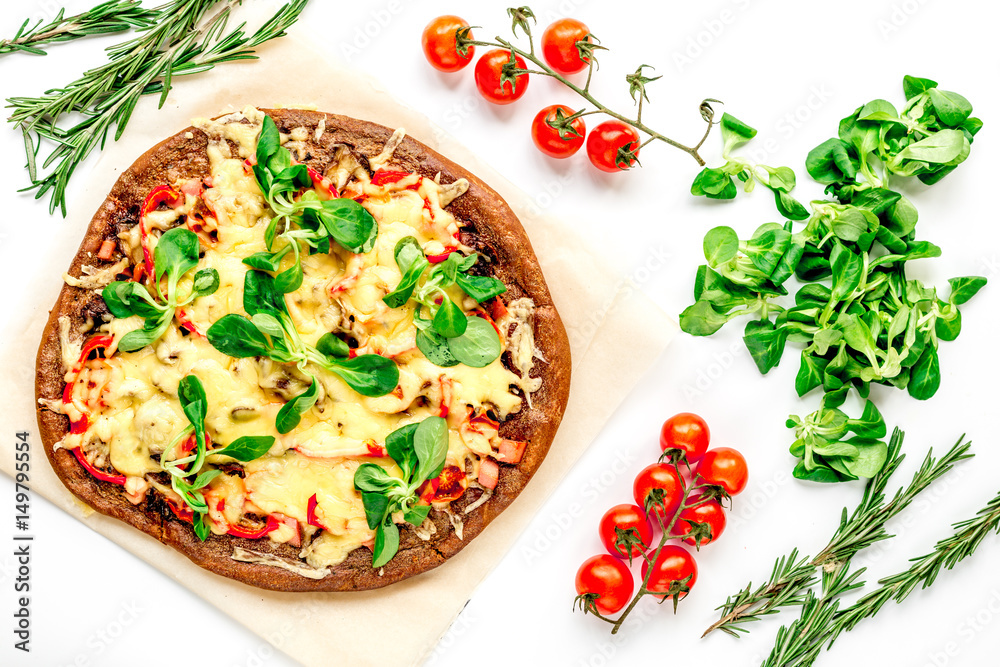 restaurant kitchen with pizza preparing on white background top view