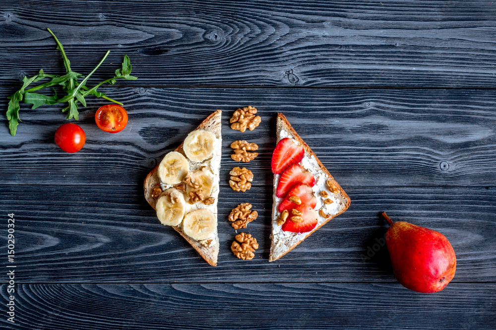 sandwiches set on dark table background top view space for text