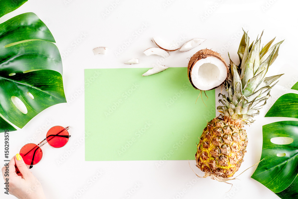 tropical fruits and glasses for summer design on white background top view mock-up