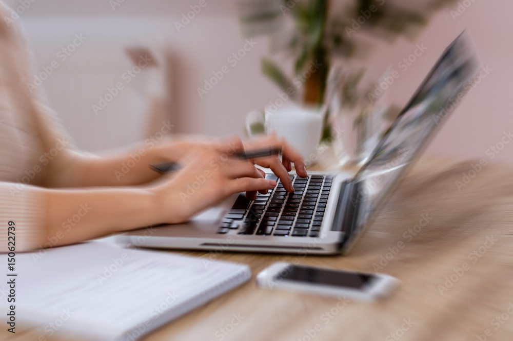 Close up of womans typing on keyboard, dramatic editing