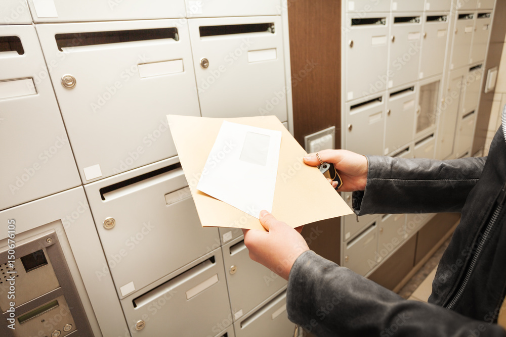 Womans hands holding envelopes with copy-space