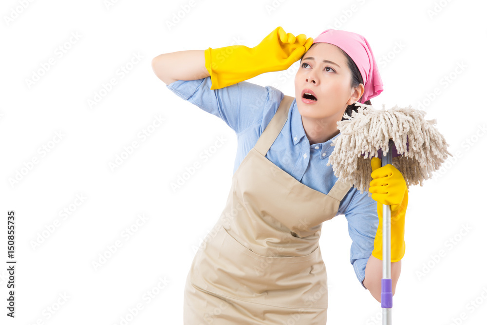 Tired and exhausted cleaning woman