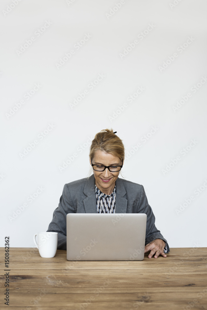 Businesswoman Smiling Happiness Working Laptop Studio Portrait