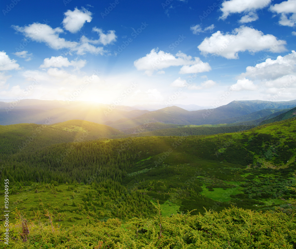 Mountain landscape on sun